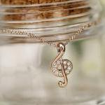 Studded Musical Note Neckl..